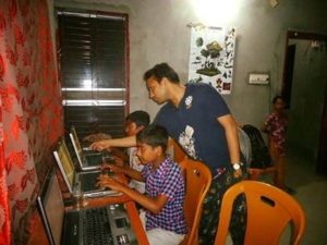 Students in Bangladesh working on computers donated by Computaris
