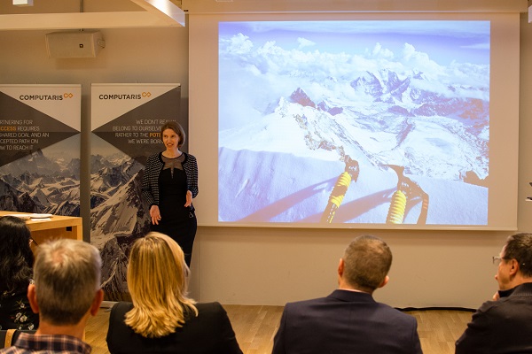 Raluca Rusu speaking at R Systems Suisse opening event in Switzerland
